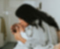 Women kissing baby